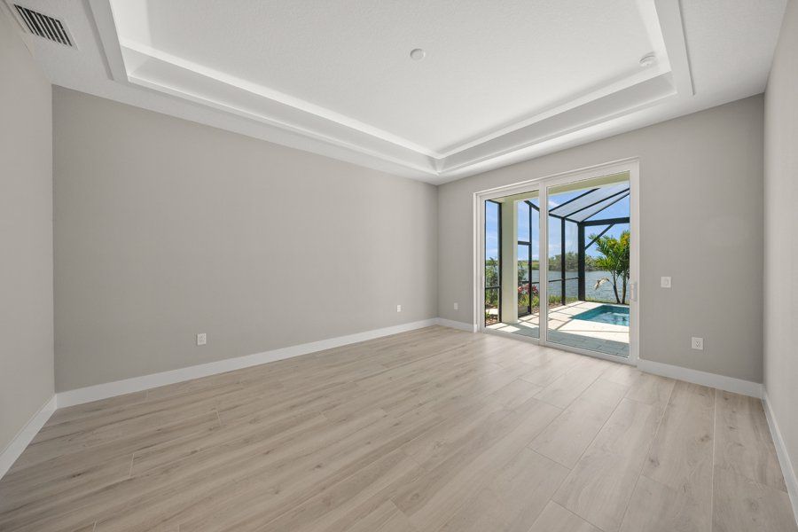 Representative unfurnished interior of a home built from the Islander I by Homes by Towne in Palmera at Wellen Park, Venice (Image 8).