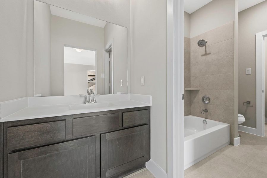 Furnished interior view inside a new home in Bridgeland, Cypress (Image 4).