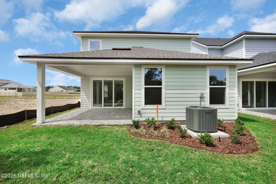 Exterior details and patio area of a home in Seabrook Village at Seabrook, Nocatee (Image 3).