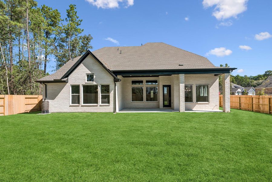 Exterior details and patio area of a home in ARTAVIA 65' Homesites, Conroe (Image 4).