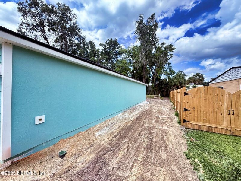 Front exterior of a new home in , Jacksonville, FL, highlighting curb appeal (Image 6).
