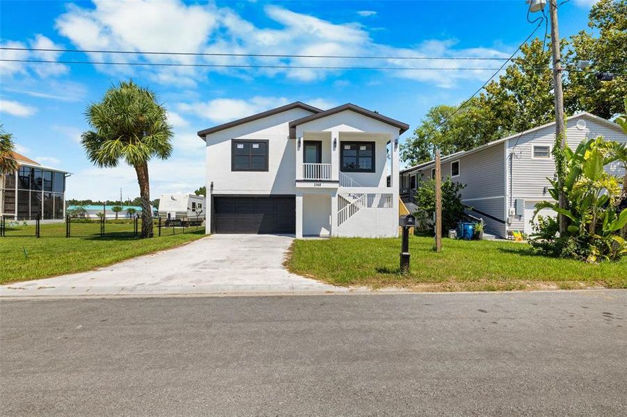 Front exterior of a new home in , Hernando Beach, FL, highlighting curb appeal (Image 19).