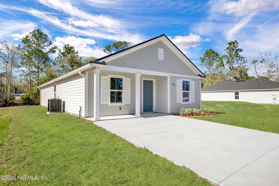 Front exterior of a new home in , East Palatka, FL, highlighting curb appeal (Image 19). Front exterior of a new home in , East Palatka, FL, highlighting curb appeal (Image 19).