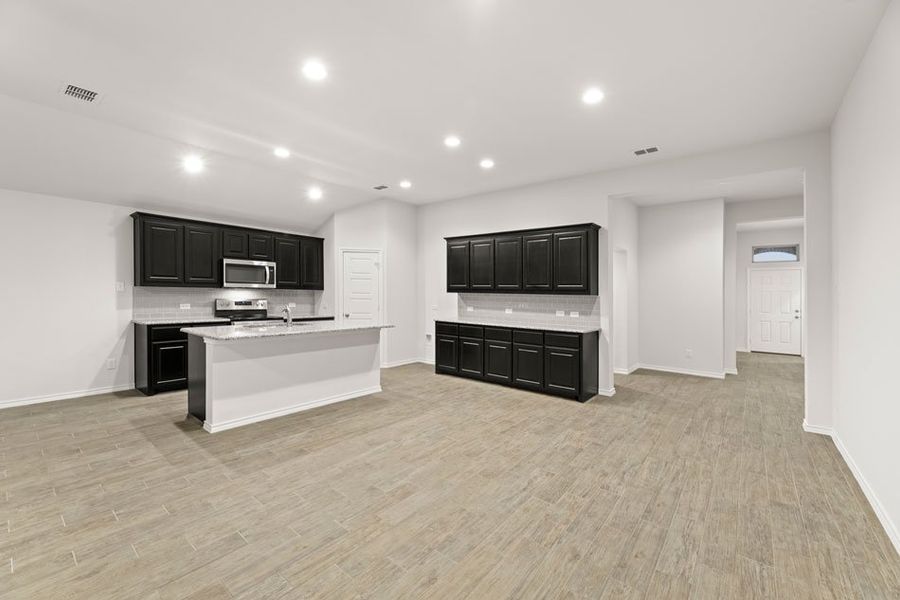 Representative exterior photo of a completed home built from the Austin by Impression Homes in DeBerry Reserve, Royse City, TX (Image 11). Representative exterior photo of a completed home built from the Austin by Impression Homes in DeBerry Reserve, Royse City, TX (Image 11).