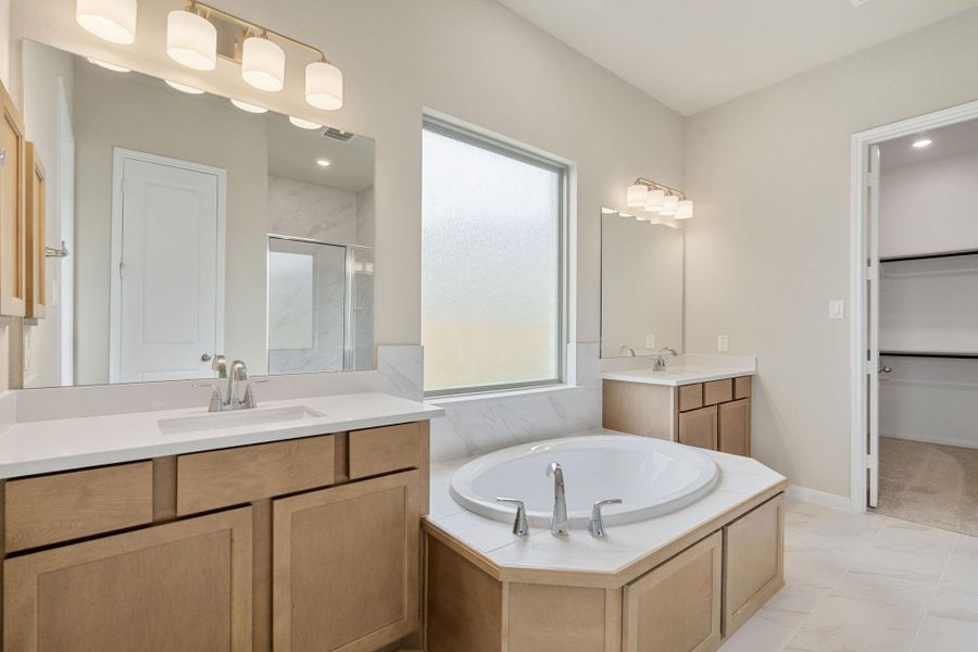 Furnished interior view inside a new home in Bridgeland, Cypress (Image 14).
