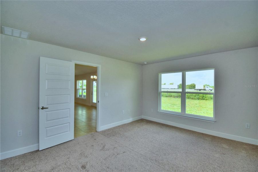 Spacious, unfurnished interior of a new home in Cadence Crossing, Auburndale (Image 24).