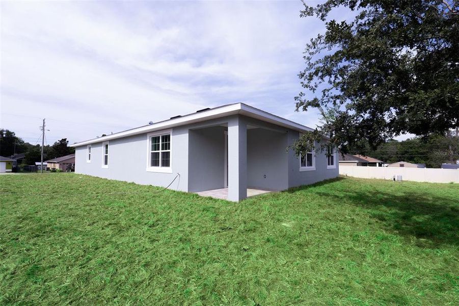 Front exterior of a new home in , Summerfield, FL, highlighting curb appeal (Image 22).