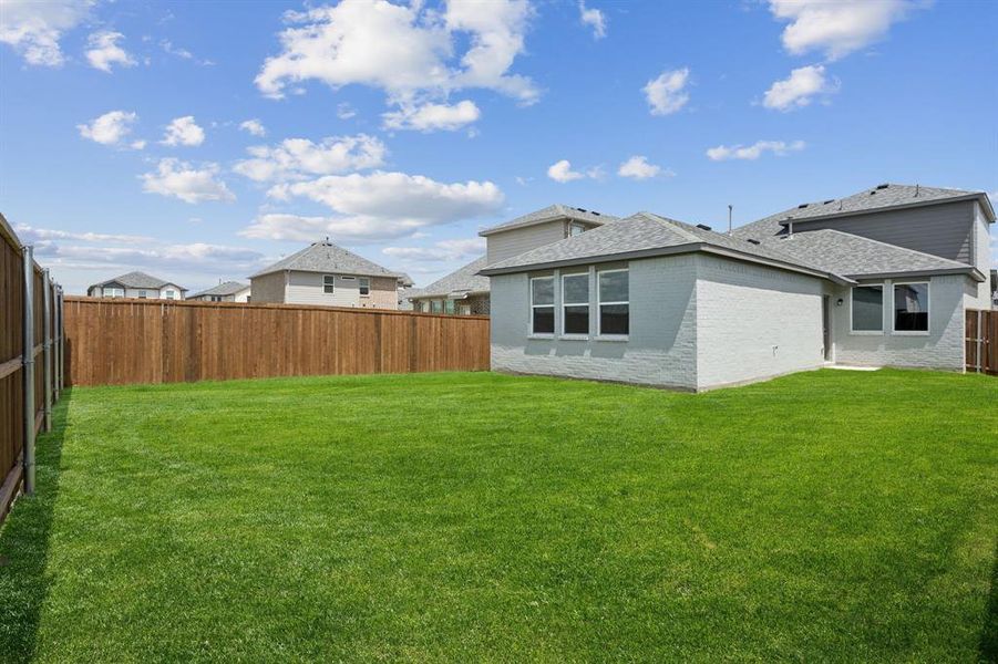 Exterior details and patio area of a home in Santorini, Seagoville (Image 3).