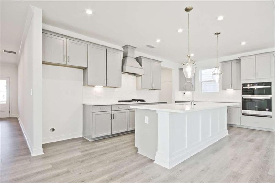 Furnished interior view inside a new home in The Paddocks at Doc Hughes, Buford (Image 5).
