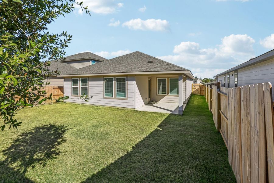 Exterior details and patio area of a home in Pine Lake Cove - Premier Series, Montgomery (Image 3).