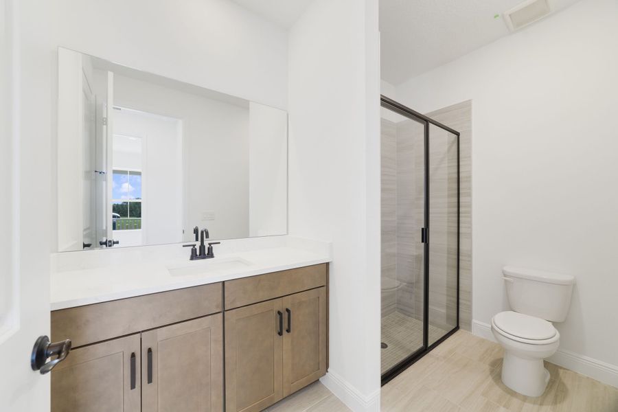 Furnished interior view inside a new home in Vintner Reserve, Clermont (Image 14).