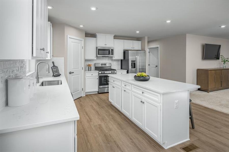 Representative furnished interior of a home built from the Eden Cay by Ryan Homes in Copper Pointe, Conway (Image 5). Representative furnished interior of a home built from the Eden Cay by Ryan Homes in Copper Pointe, Conway (Image 5).