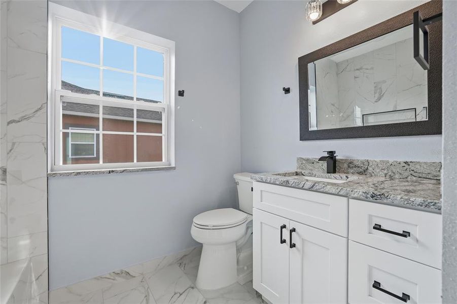 Furnished interior view inside a new home in , Tarpon Springs (Image 29).