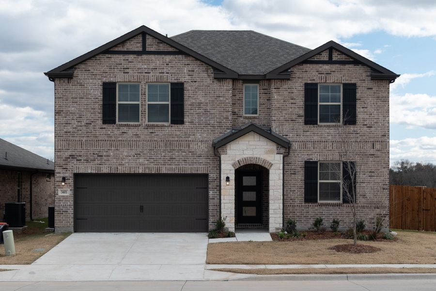 Front exterior of a new home in Churchill, Anna, TX, highlighting curb appeal (Image 1). Front exterior of a new home in Churchill, Anna, TX, highlighting curb appeal (Image 1).
