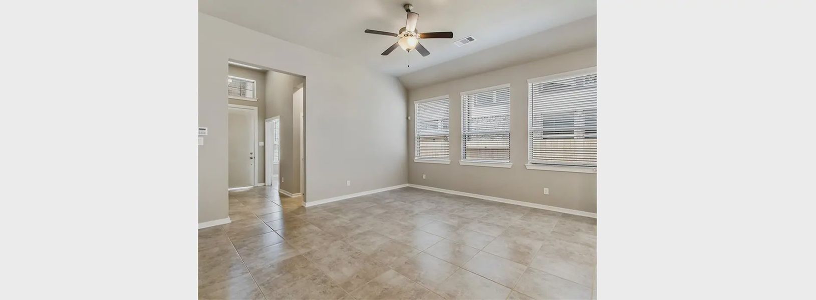 Representative unfurnished interior of a home built from the Rowen by Chesmar Homes in Wood Leaf Reserve, Tomball (Image 7).