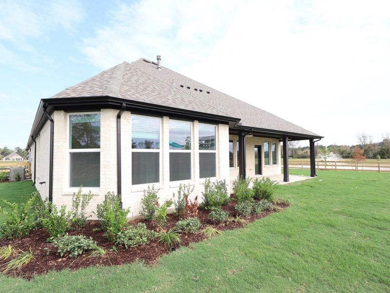 Exterior details and patio area of a home in Sorella, Tomball (Image 12). Exterior details and patio area of a home in Sorella, Tomball (Image 12).