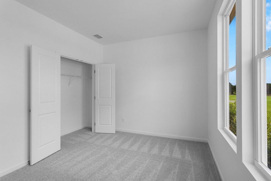 Representative unfurnished interior of a home built from the Moreland by Taylor Morrison in Weatherfield, Buford (Image 28).