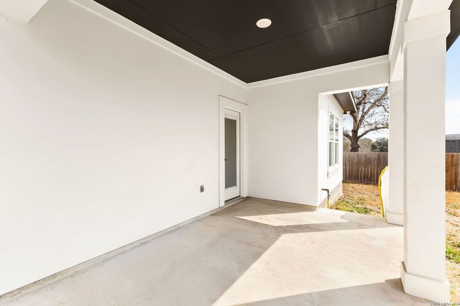 Exterior details and patio area of a home in , Elmendorf (Image 20).