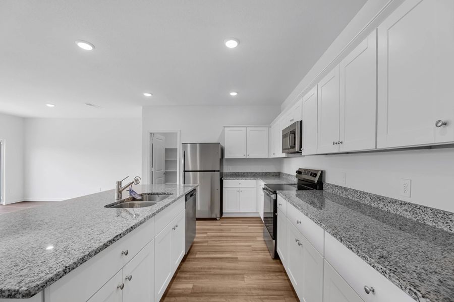 Representative furnished interior of a home built from the Kepler by Starlight Homes in Royal Pines, Porter (Image 8).