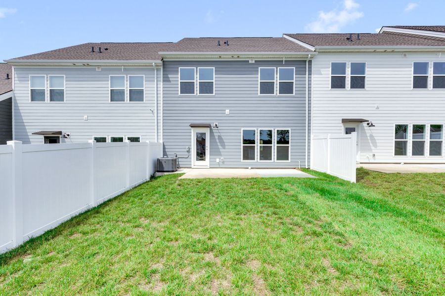 Exterior details and patio area of a home in Harvest Point, Spring Hill (Image 4).