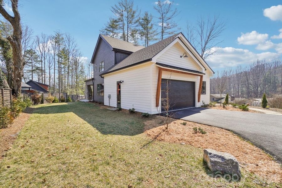 Front exterior of a new home in , Brevard, NC, highlighting curb appeal (Image 26).