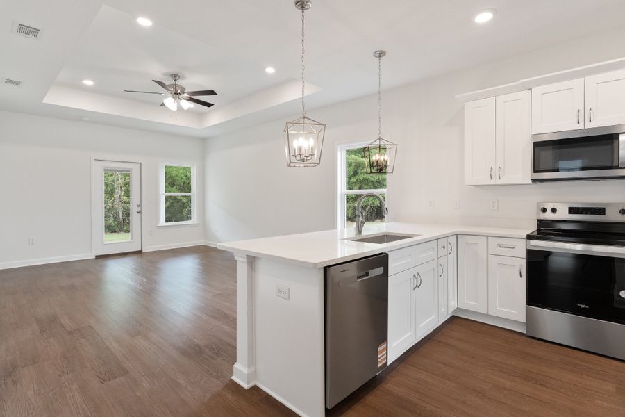 Furnished interior in a model home at Homewood Estates in Crestview (Image 20).