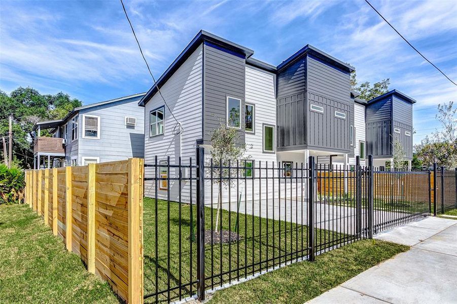 Front exterior of a new home in , Houston, TX, highlighting curb appeal (Image 24).