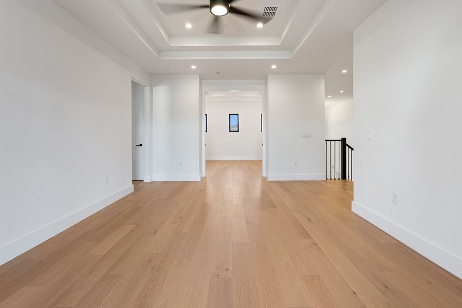 Spacious, unfurnished interior of a new home in Milky Way at River Place, Austin (Image 25).