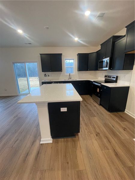 Furnished interior view inside a new home in Springwood Grove, Central (Image 5).