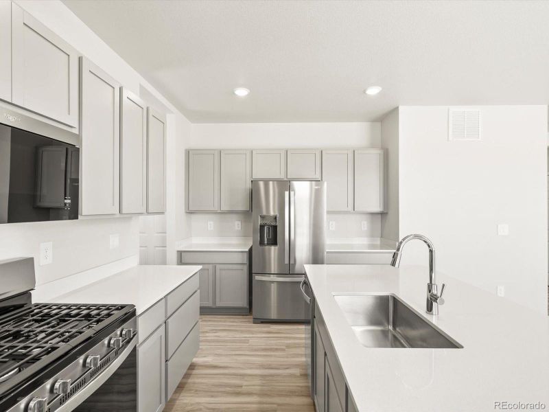 Furnished interior view inside a new home in Poudre Heights: The Lakes Collection, Windsor (Image 9).