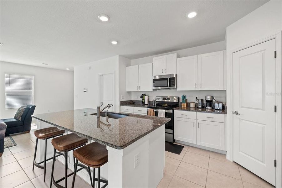 Furnished interior view inside a new home in Verano: The Manors, Spring Hill (Image 32).