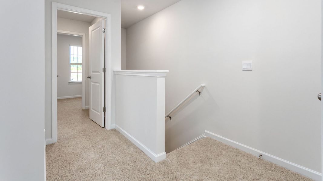 Representative unfurnished interior of a home built from the NEWTON by D.R. Horton in Henley Ridge, Graham (Image 11).