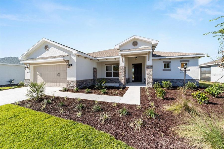 Front exterior of a new home in , Ocala, FL, highlighting curb appeal (Image 21). Front exterior of a new home in , Ocala, FL, highlighting curb appeal (Image 21).