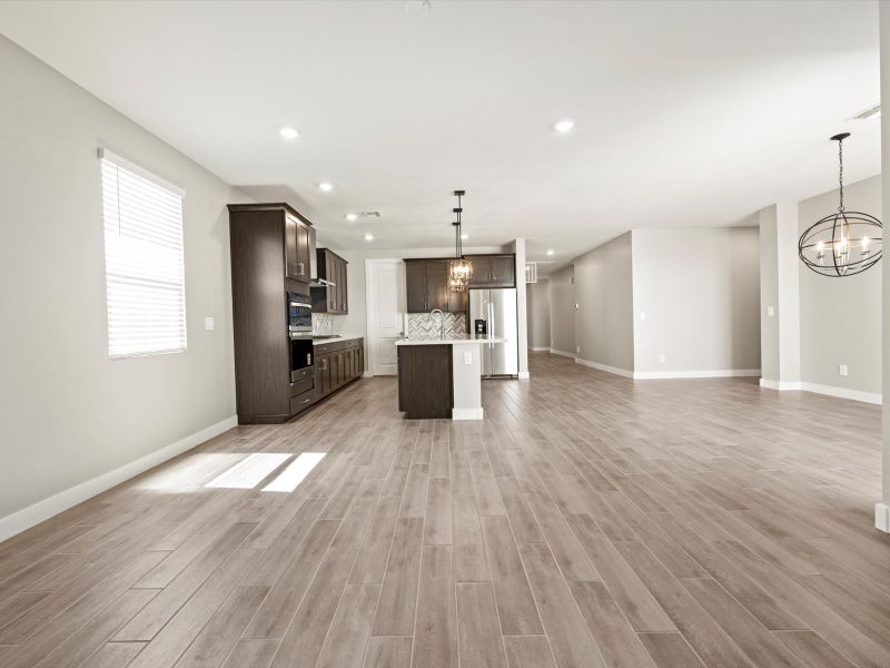 Spacious, unfurnished interior of a new home in Blossom Rock Reserve Series, Apache Junction (Image 9). Spacious, unfurnished interior of a new home in Blossom Rock Reserve Series, Apache Junction (Image 9).