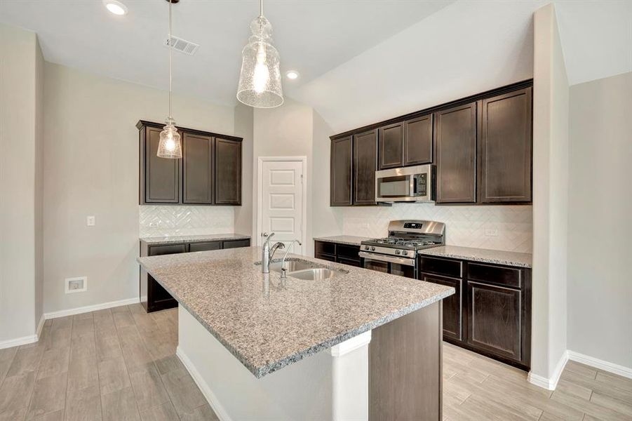 Furnished interior view inside a new home in Woodstone, Providence Village (Image 5). Furnished interior view inside a new home in Woodstone, Providence Village (Image 5).