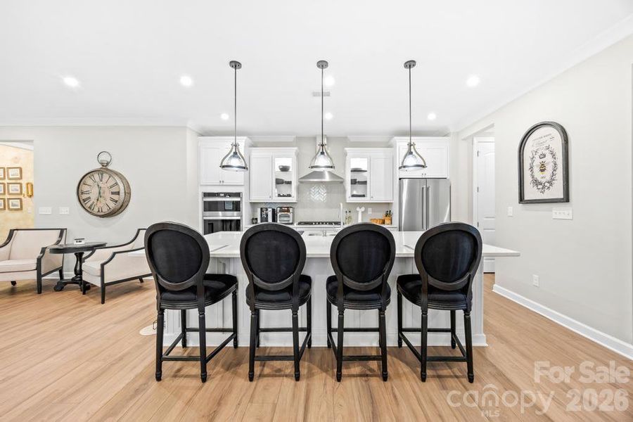 Sellers upgraded lighting in dining room with pendants