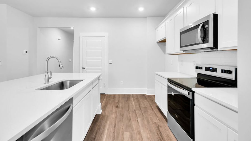 Furnished interior view inside a new home in Magnolia Ridge at Blake Farm, Wilmington (Image 9).