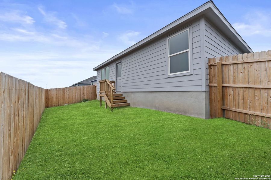 Exterior details and patio area of a home in Voss Farms: Watermill Collection, New Braunfels (Image 2).