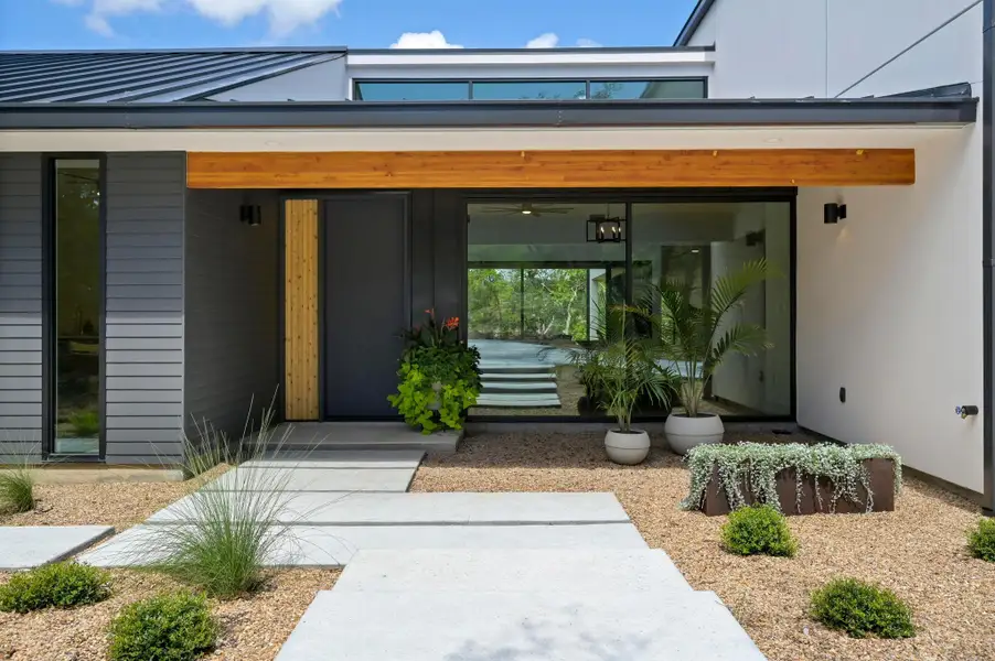 Front exterior of a new home in , Jonestown, TX, highlighting curb appeal (Image 1). Front exterior of a new home in , Jonestown, TX, highlighting curb appeal (Image 1).