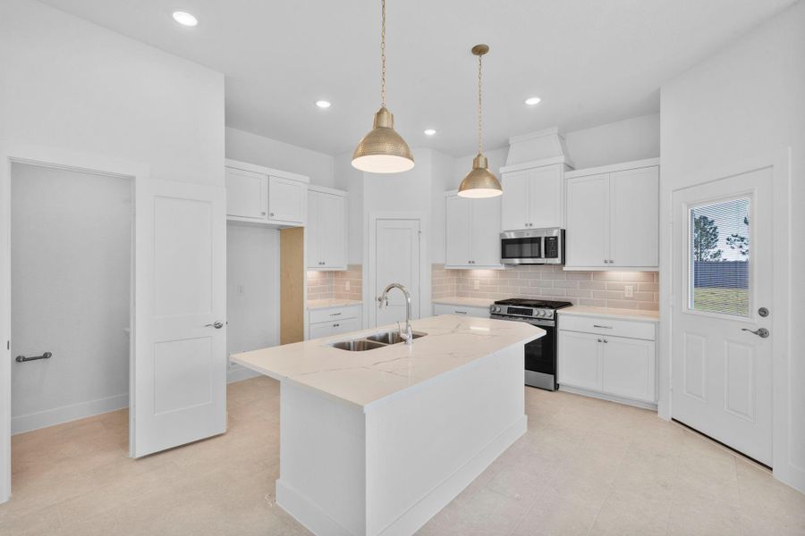 Furnished interior view inside a new home in Bridgeland, Cypress (Image 5).