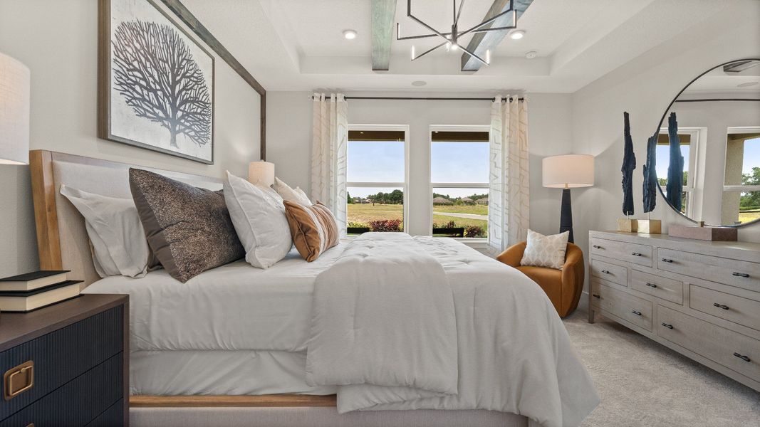 Contemporary Primary Suite with in this New Construction Home in Winter Haven Florida by DRB Homes in Willowbrook North