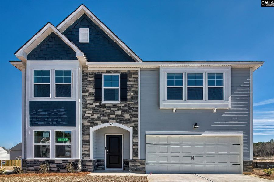 Front exterior of a new home in Cottages at Roofs Pond, West Columbia, SC, highlighting curb appeal (Image 1).
