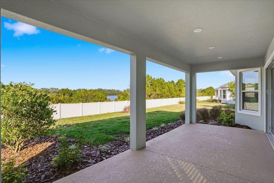 Exterior details and patio area of a home in Esplanade at Center Lake Ranch, St. Cloud (Image 3).