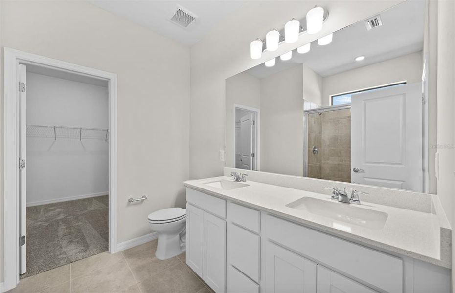 Furnished interior view inside a new home in The Strand at Cedar Grove, North Port (Image 9).