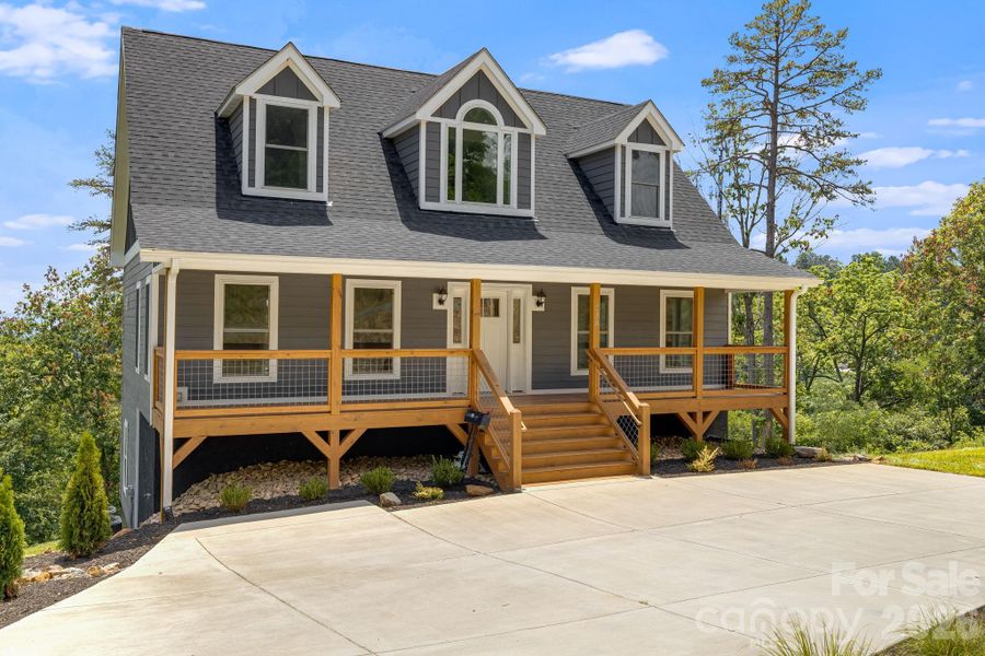 Front exterior of a new home in , Asheville, NC, highlighting curb appeal (Image 19). Front exterior of a new home in , Asheville, NC, highlighting curb appeal (Image 19).