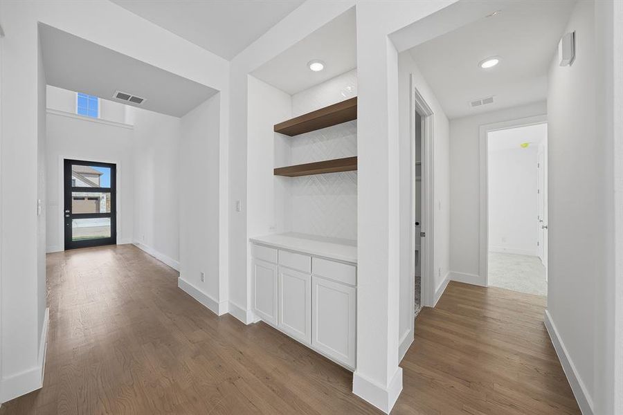 Hall with dark wood finished floors Hall with dark wood finished floors