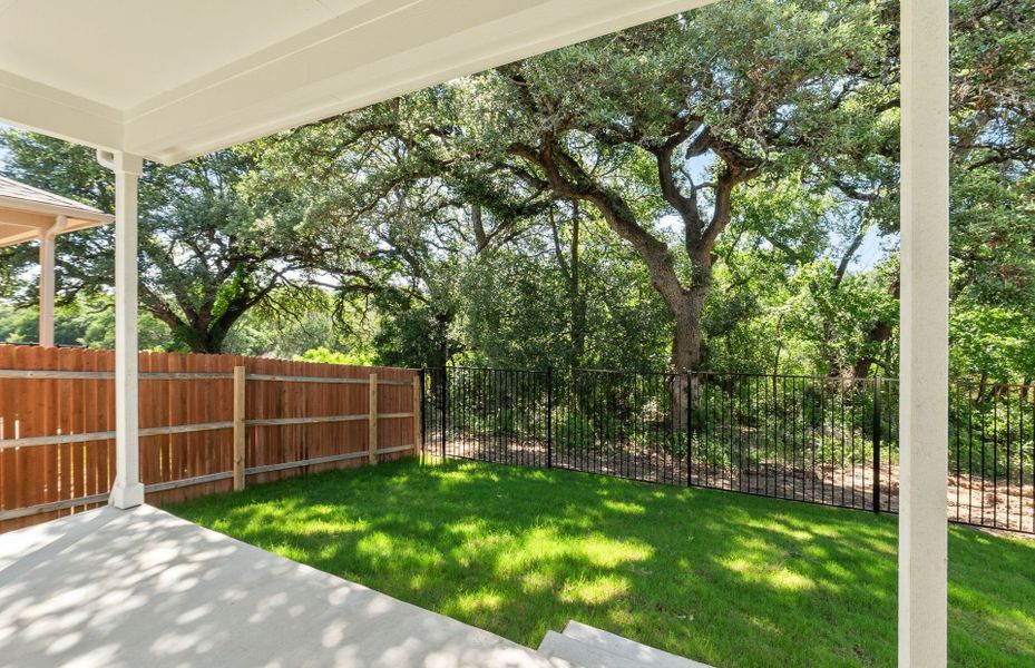 Exterior details and patio area of a home in Saddleback at Santa Rita Ranch, Liberty Hill (Image 23).
