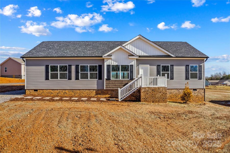 Front exterior of a new home in , Statesville, NC, highlighting curb appeal (Image 20).
