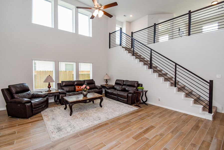 Elegant, monumental staircase in the spacious living room. Elegant, monumental staircase in the spacious living room.