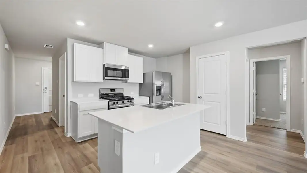 Furnished interior view inside a new home in Sunnycreek, Crowley (Image 4).